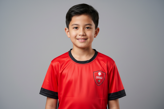 Red sports jersey with black accents and a logo on a white background