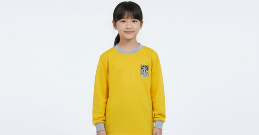 A yellow unisex long-sleeved sports shirt with a grey collar and a logo on the chest.